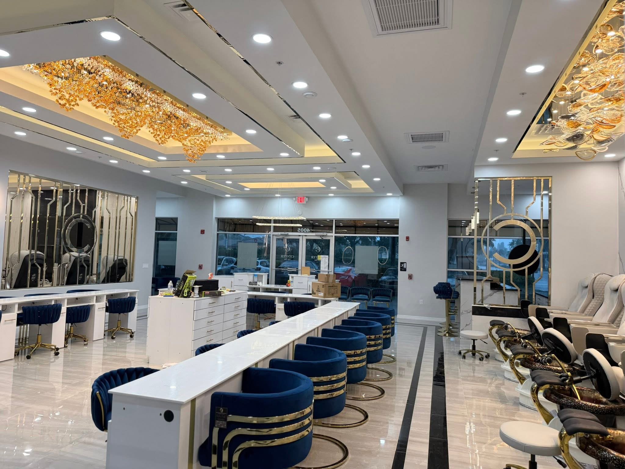 Finished luxury nail salon interior with manicure stations and pedicure chairs